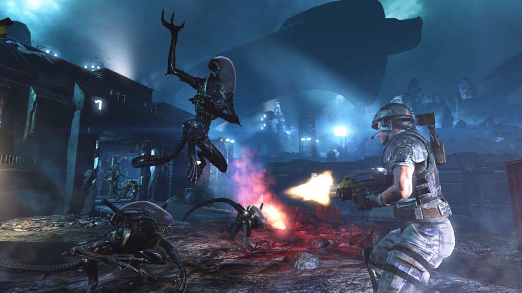 A lone space marine fires their pulse rifle at a group of incoming xenomorphs.