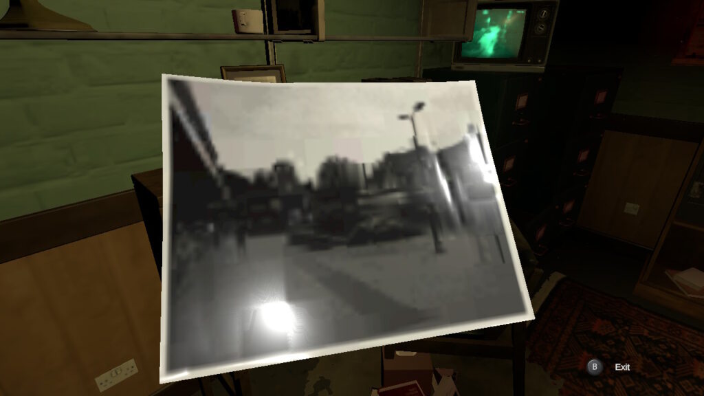A black and white photograph of a blurred street.