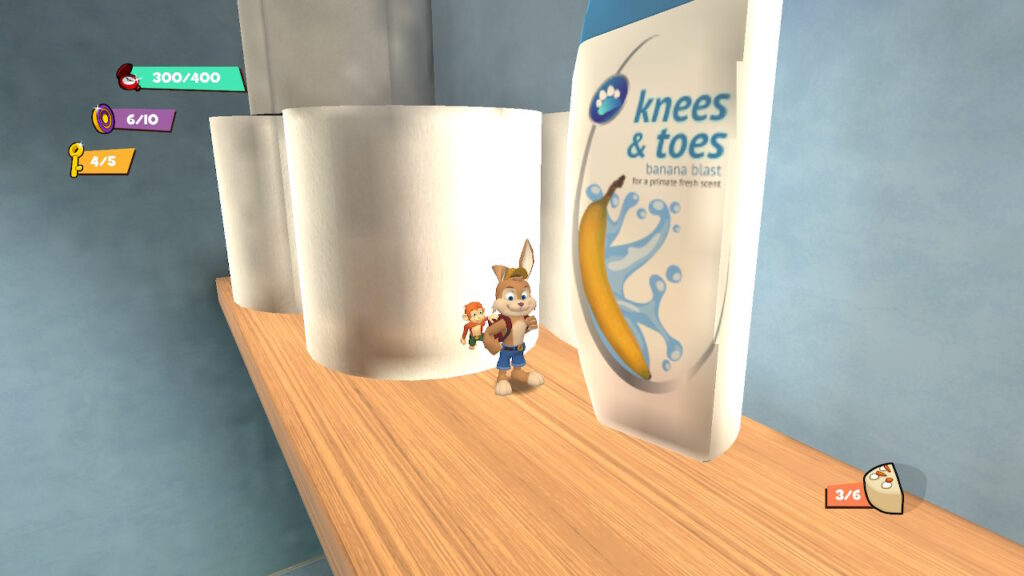 Clive and Wrench stands next to a shampoo bottle with the caption 'knees & toes'
